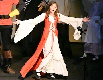 Olivia performing in Beauty and the Beast