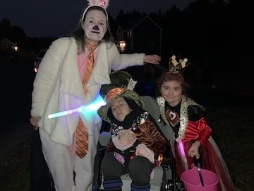 Halloween- Momma is the white rabbit, Charlie is the Madhatter, and Olivia is the Queen of Hearts