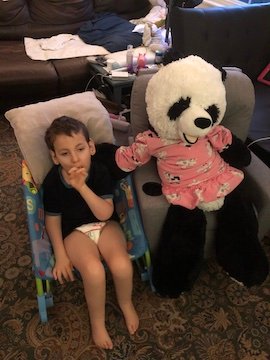 Charlie Karrat sharing space with Panda.